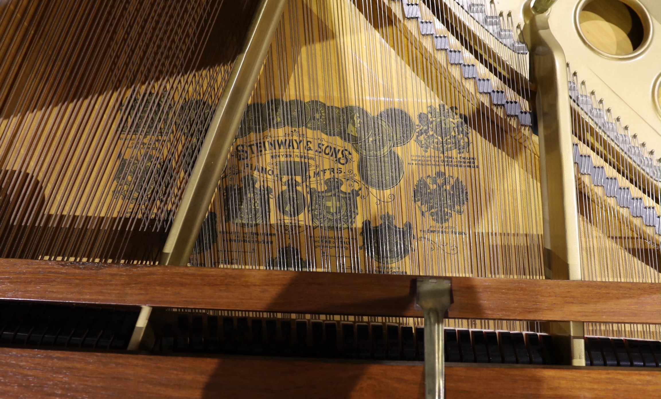 A Steinway & Sons of New York Patent Grand Construction mahogany cased piano, no.157302, width 148cm depth 180cm height 97cm